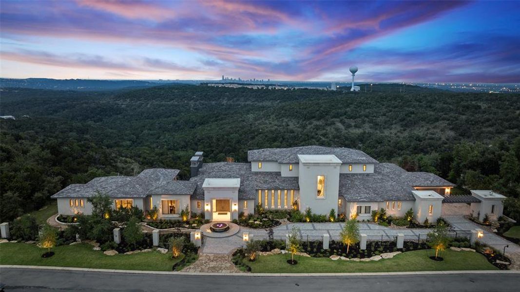 Embark on a journey into the realm of unparalleled luxury living with this remarkable estate, an exquisite sanctuary nestled within the prestigious, gated community of Barton Creek.