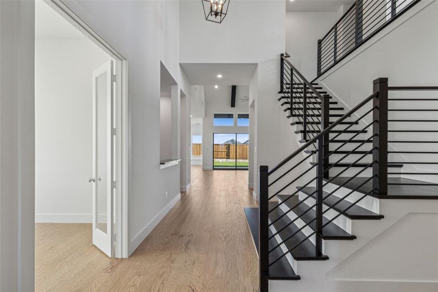 Beautiful and stylish metal railing makes a grand statement in this gorgeous home!