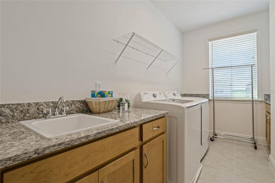 Laundry room located near bedrooms