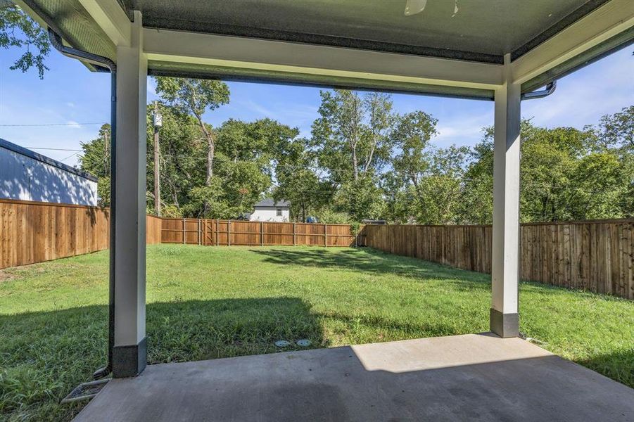 View of yard with a patio