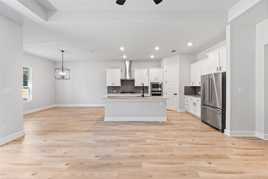 The dining area is open to both kitchen and entertaining areas, allowing a great flow from room to room.