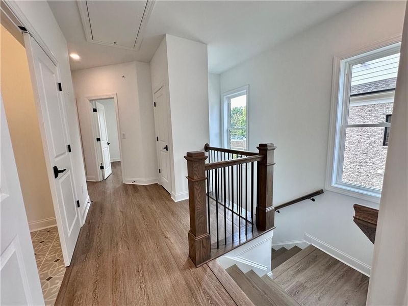 Showcases additional windows in the stairwell on the upper level