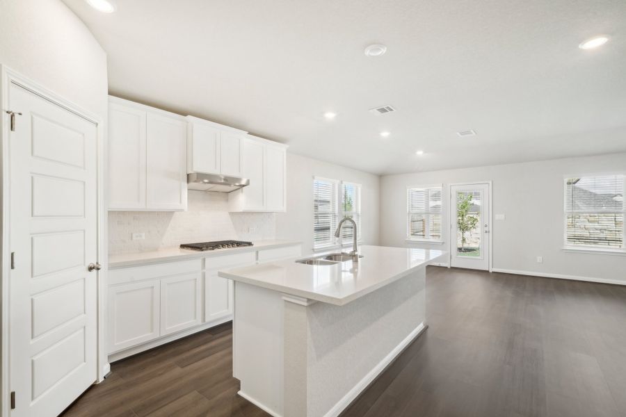 Kitchen in the Fitzhugh floorplan in a Meritage Homes community.