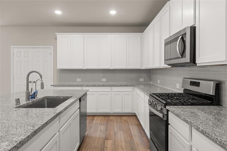 This kitchen is not only a functional space but also has ample storage. Whether you're a seasoned chef or just love to gather and enjoy good food, this kitchen is a dream come true.