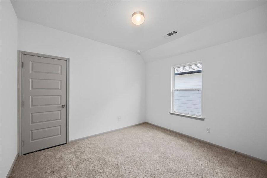 Secondary bedrooms have soft carpet for your feet and plenty of natural light for your mood.