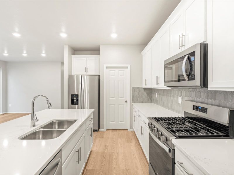 The Vail floorplan interior image taken at a Meritage Homes community in Northern Colorado.