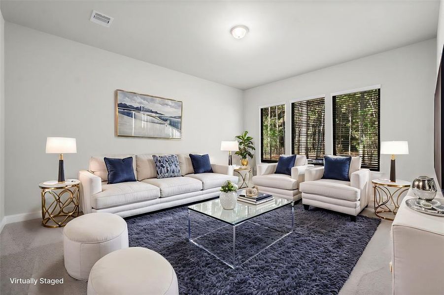 Family room with a modern fireplace.