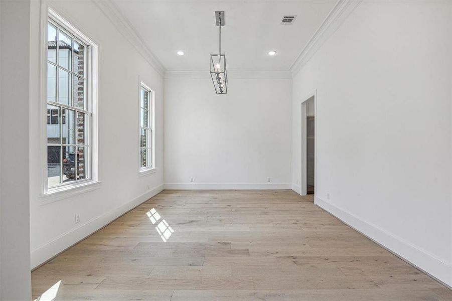 Dining room with chandelier is located at the front of the house