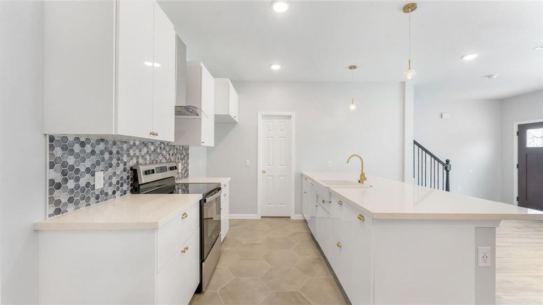 Gourmet Kitchen Will Be Any Home Chef's Dream. It Features Stunning Quartz Countertops, All Matching Appliances, Tons Of Cabinet Space And An Oversized Pantry That Fits Absolutely Everything