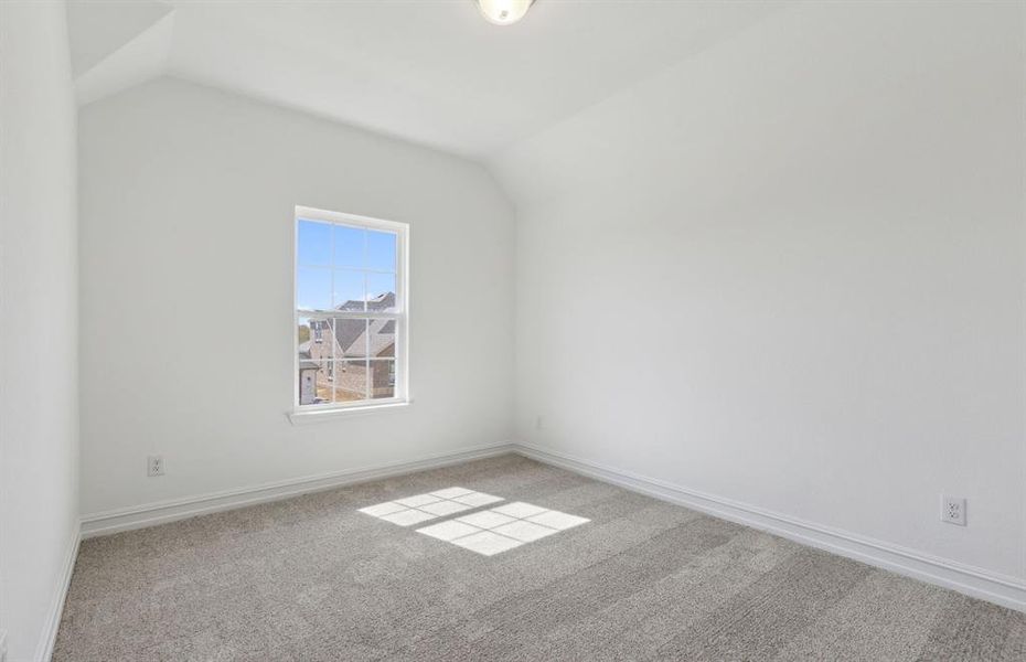 Spacious secondary bedroom with ample closet space *real home pictured