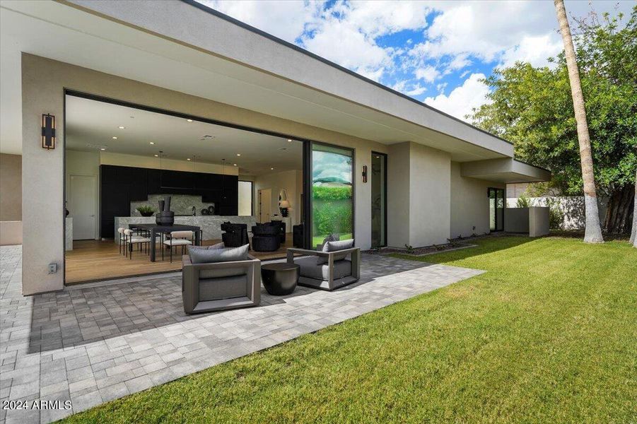 Side Patio with Lush Grass