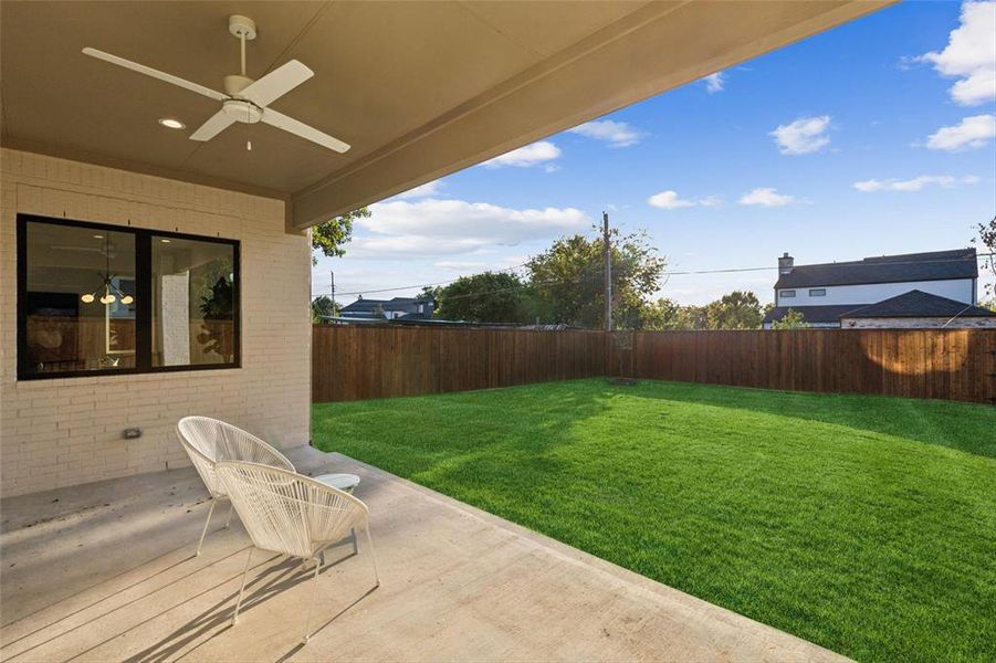 Covered Back Patio Open to Oversized Backyard