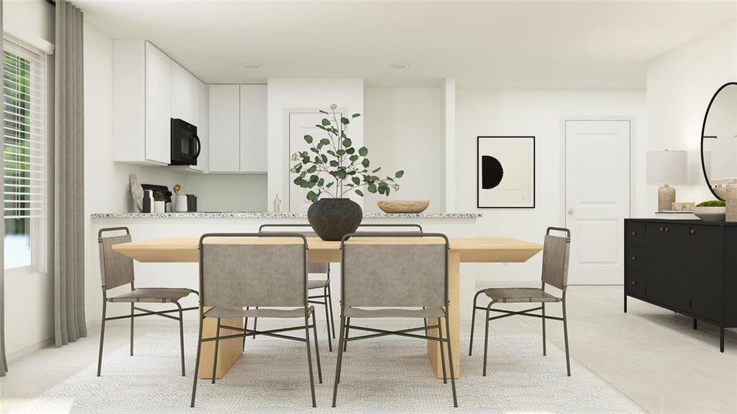 Dining area with light tile flooring