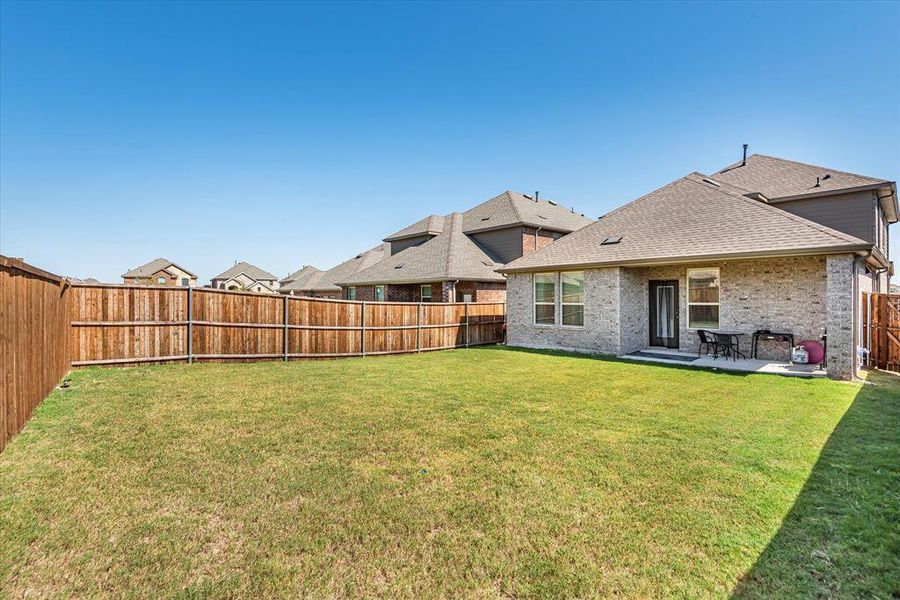 View of yard featuring a patio area