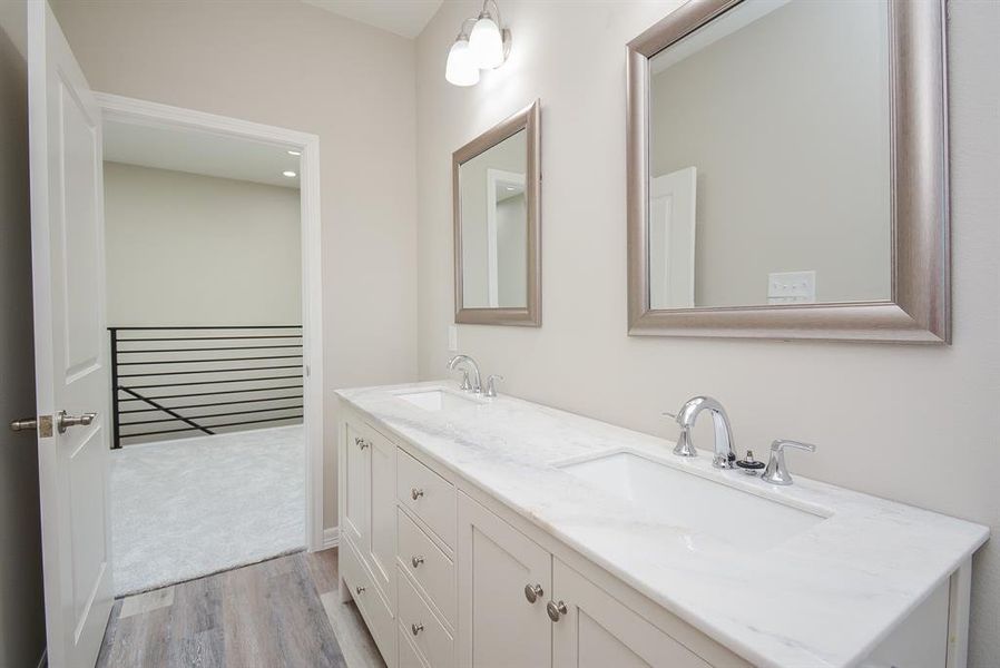 Shaker vanity with double sinks in secondary bathroom!