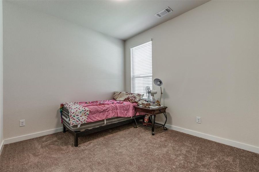 Bedroom with carpet floors