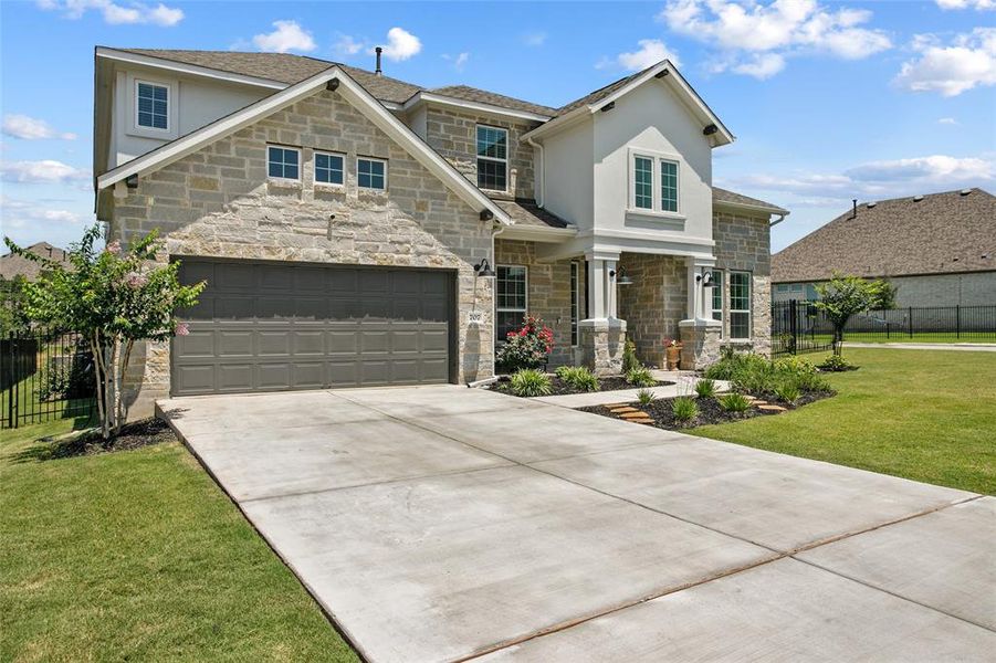 This home offers a large 3 car tandem garage