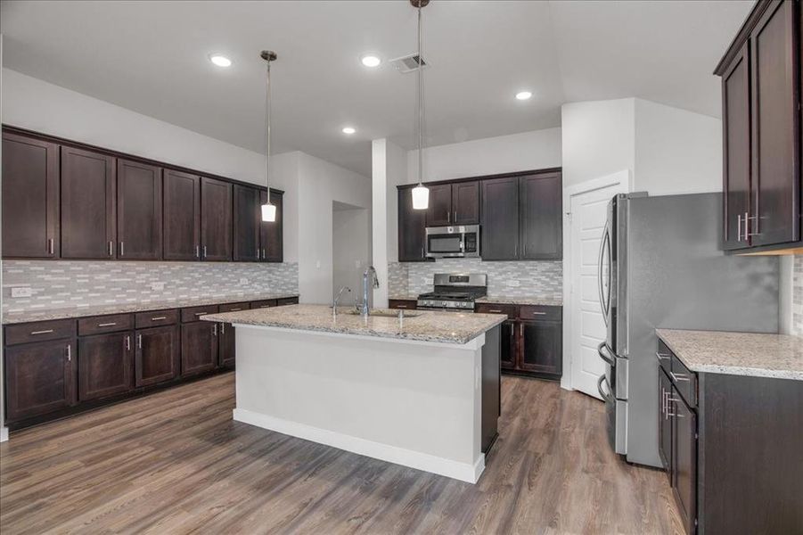 So much counter and cabinet space perfect for family gatherings or entertaining!