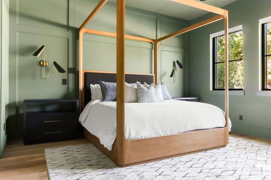 Bedroom with hardwood / wood-style floors