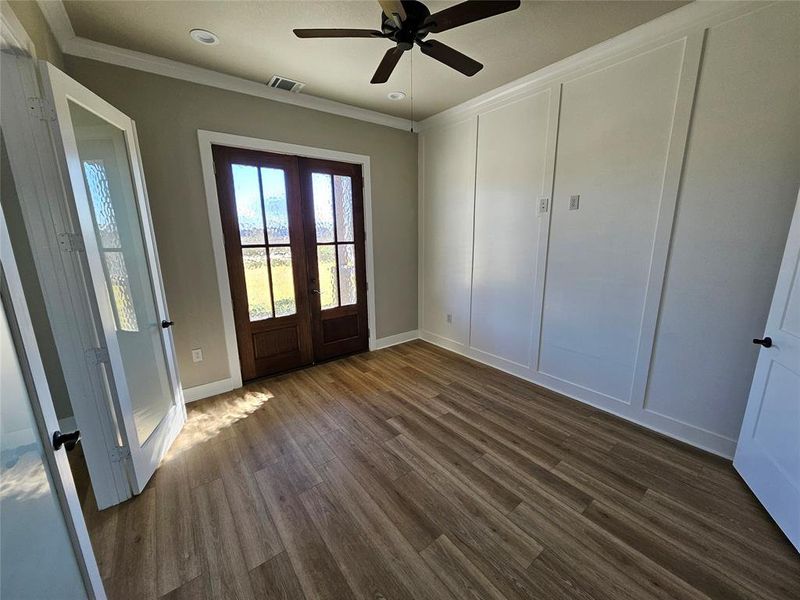 Office with french doors that could double as a guest bedroom (has a closet and full bathroom attached)