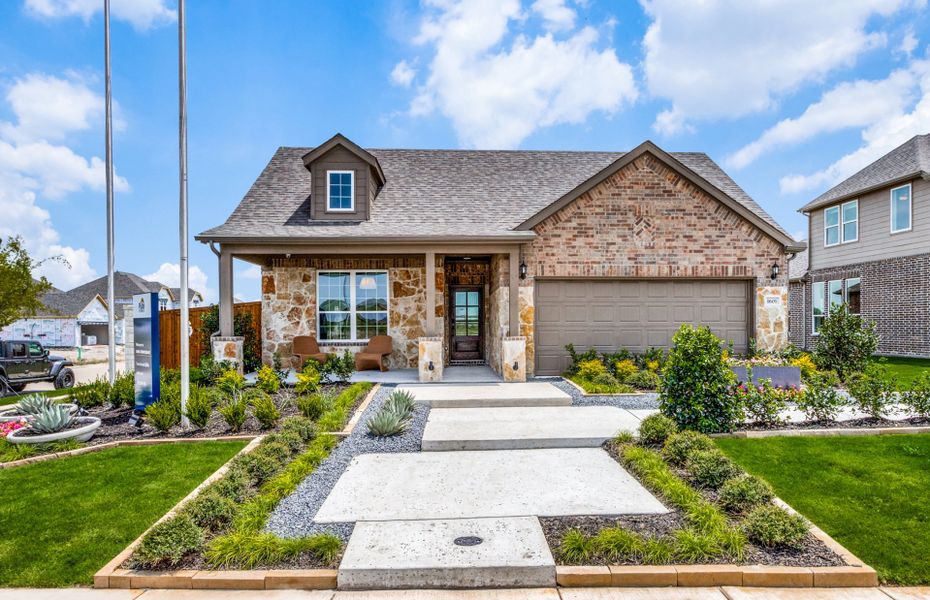 The Emory, a one-story home with 2-car garage, shown with Home Exterior 37