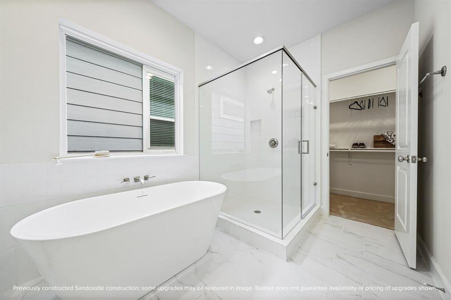 Retreat to a sanctuary of elegance with a freestanding tub and a refreshing step-in shower. Pamper yourself every day.