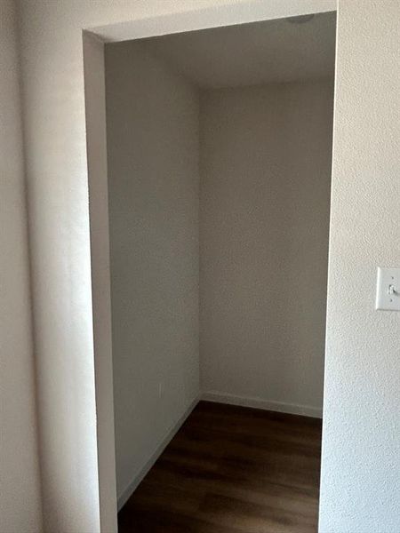 Unfurnished room featuring wood-type flooring