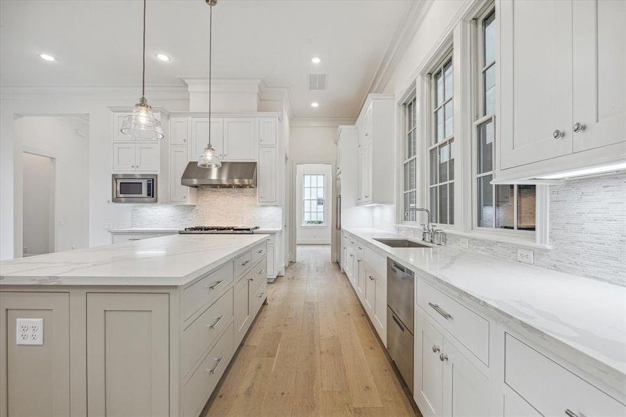 Another view of the kitchen leading to the dining room