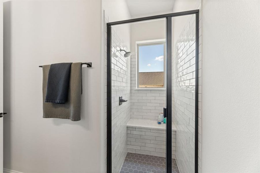 Bathroom featuring an enclosed shower