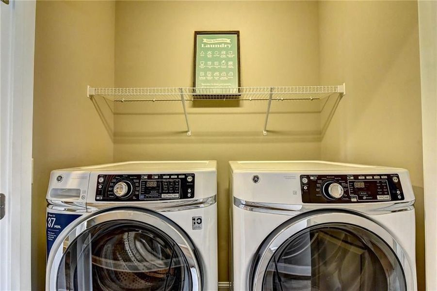 Clothes washing area with washer and clothes dryer  ( not included) ***Photos NOT OF ACTUAL Home but for representation Purposes only. Home is UNDER Construction- Photos are of a previously built Model House Freemont plan by The Providence Group