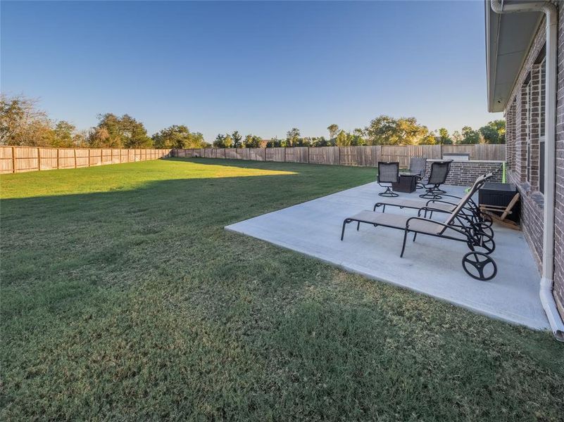 another view of the back yard standing at the side of your home