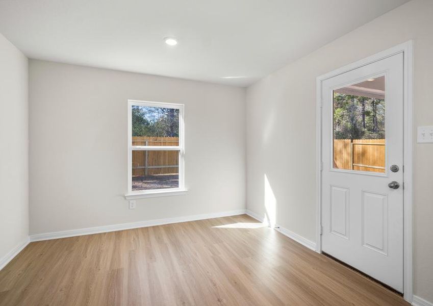 The dining room leads to the a covered patio.