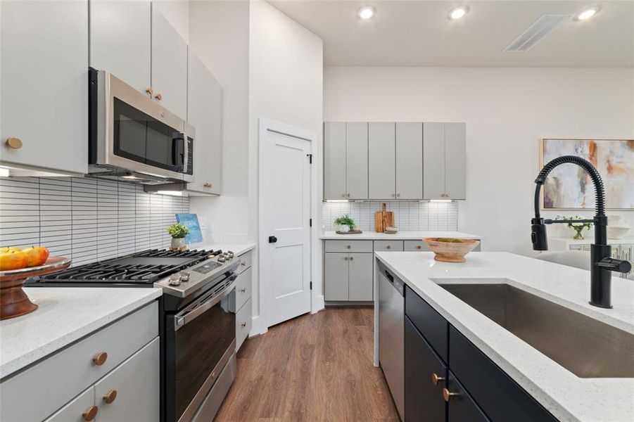 Sink Overlooks Into The Family Room So You Don't Miss Any Of The Action While Getting All Those Chores Done