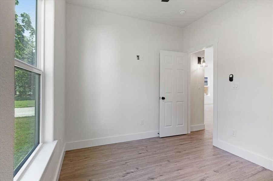 Spare room featuring light hardwood / wood-style flooring