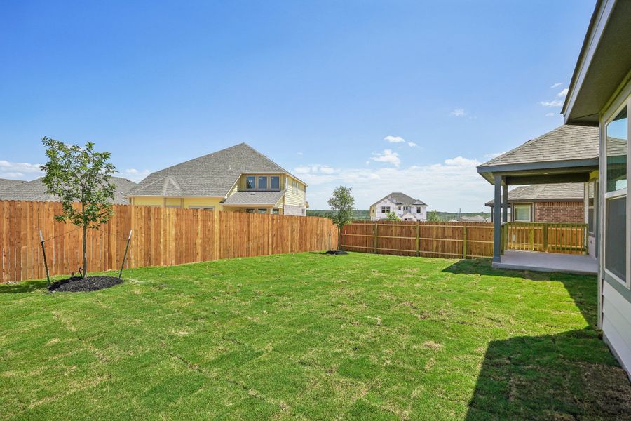 Back exterior of the Fitzhugh floorplan at a Meritage Homes community.