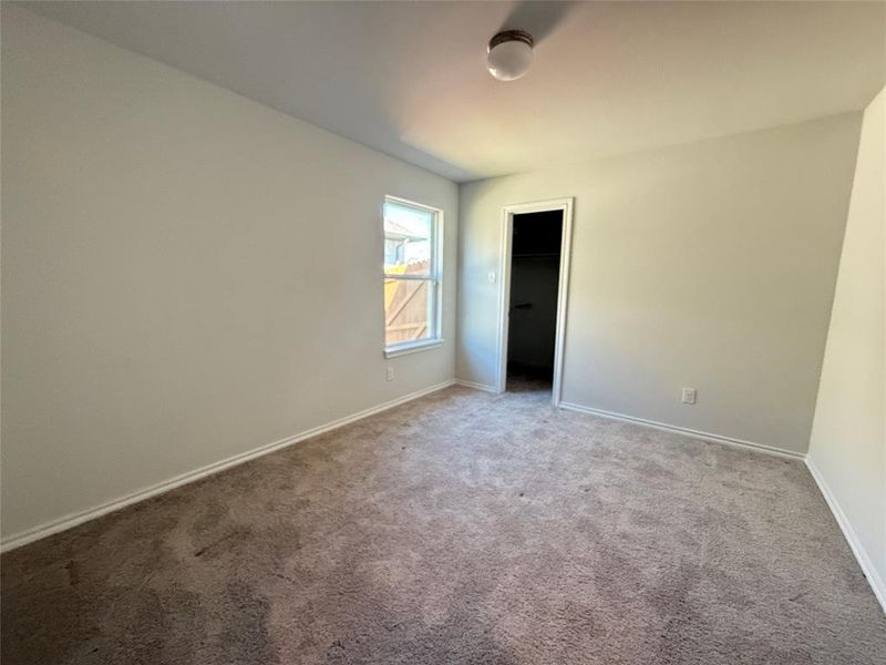 Empty room with carpet flooring