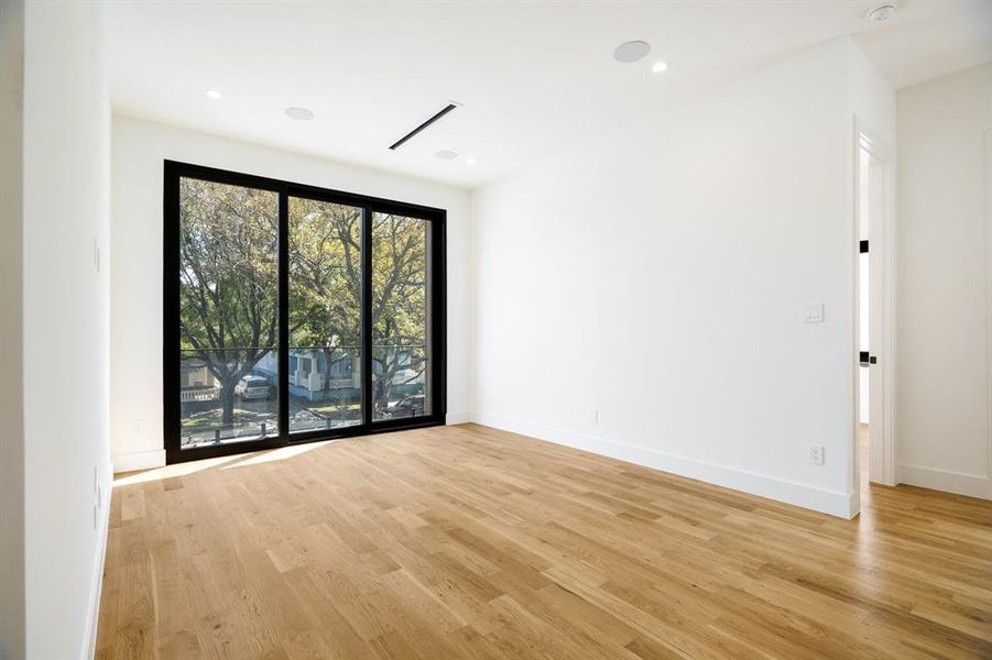 Spare room with light hardwood / wood-style flooring