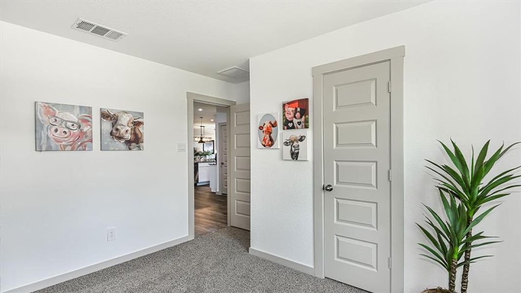 When you open that door you will you will see the 2nd Guest Bedroom with High Ceilings and more! **Image Representative of Plan Only and May Vary as Built**