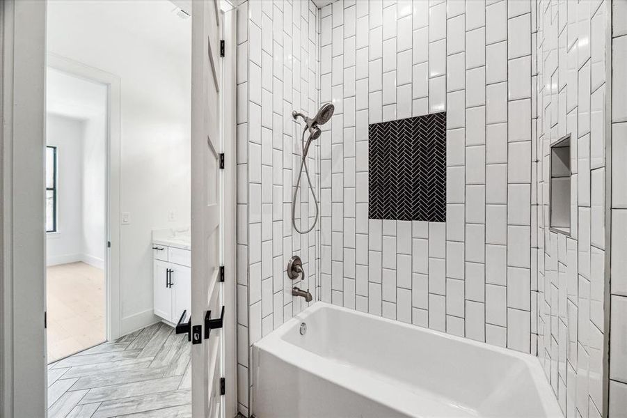 Tub/shower combo that is connected between bedroom 1 and 2