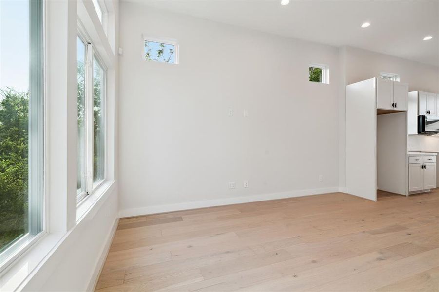 The living area is spacious in size as the second floor comes with wide plank engineered hardwoods.