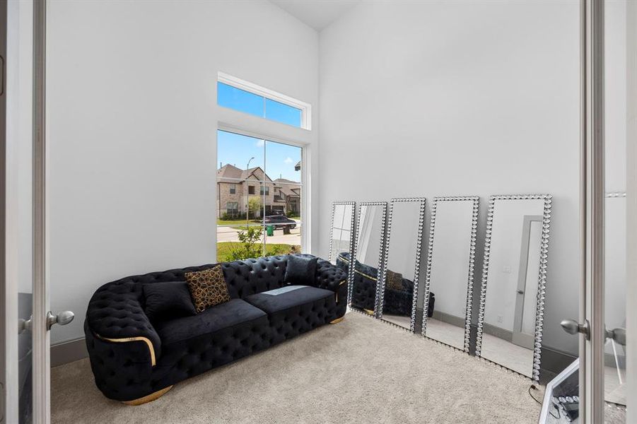 In the front of the home, there is a flex room perfect for an office or formal living room.