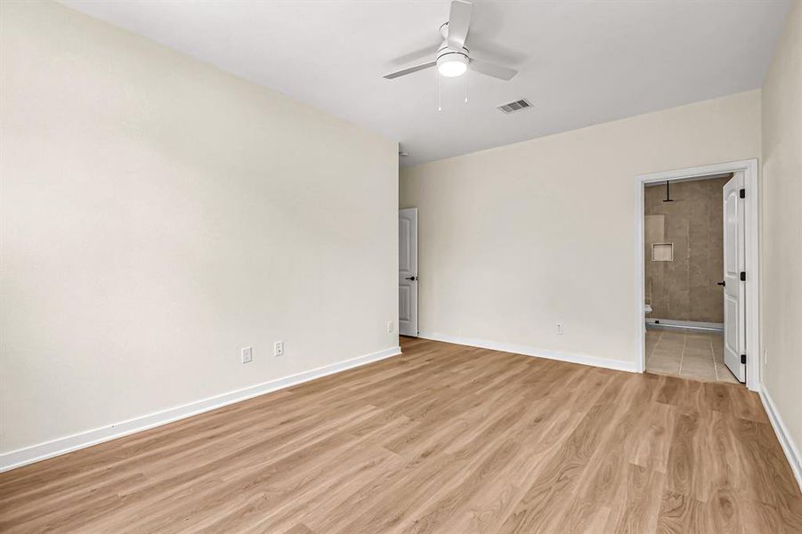 Primary bedroom with ensuite bath.