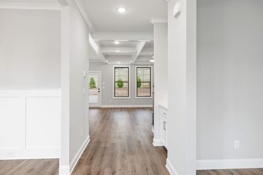 The inviting foyer leads to the formal dining room