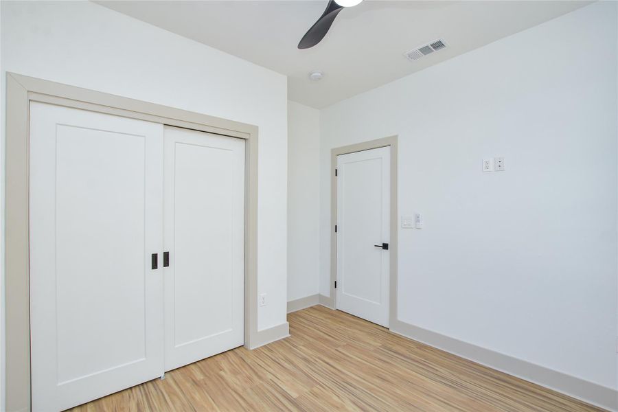 Main floor bedroom w/closet. Ceiling fan.