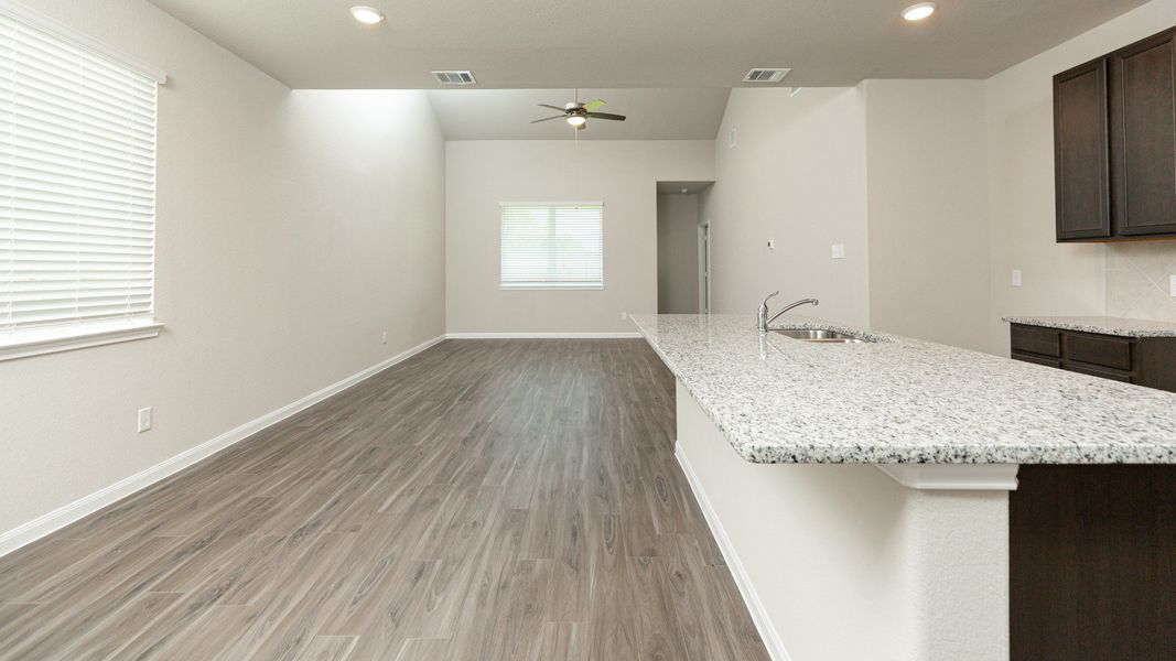 Dining Area and Kitchen to Family Room