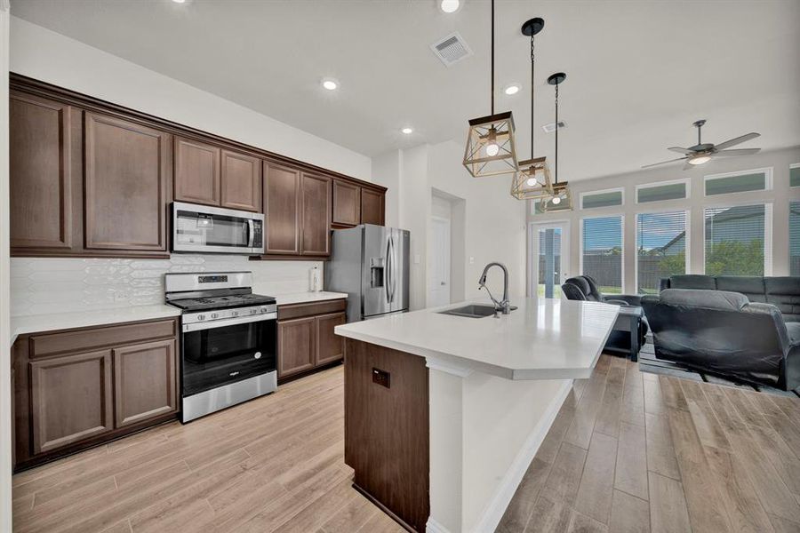 Beautiful kitchen with large island and plenty of natural light