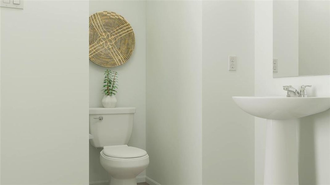 Bathroom with sink and toilet