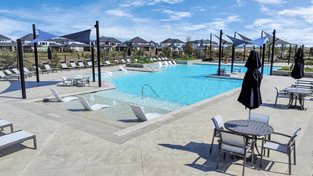 A stunning resort-style pool with lounge areas, perfect for relaxation and recreation.