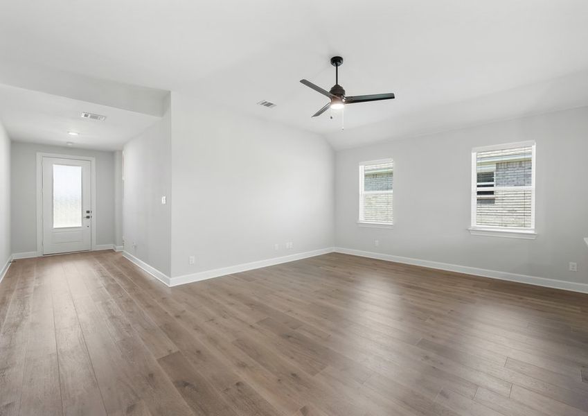 The front door leads owners and guests into the foyer that leads right into the family room.