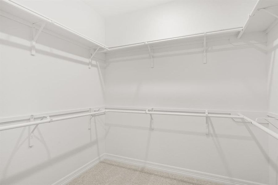 A view of your large primary walk-in Closet
